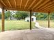 Covered patio with view of backyard and storage shed at 4230 Northaven Dr, Charlotte, NC 28206