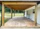 Unfinished covered patio adjacent to the house at 4230 Northaven Dr, Charlotte, NC 28206