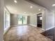 Spacious dining area with tile flooring and large windows at 4230 Northaven Dr, Charlotte, NC 28206