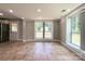 Sunlit dining area with tile floors and access to backyard at 4230 Northaven Dr, Charlotte, NC 28206