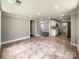 Eat-in kitchen with tile floors and an open feel to the living area at 4230 Northaven Dr, Charlotte, NC 28206