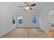Spacious bedroom features tray ceiling, a ceiling fan, and natural light, offering comfort and style at 6169 Long Branch Rd, Salisbury, NC 28147