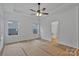 Bright bedroom featuring tray ceiling and a ceiling fan, offering comfort and style at 6169 Long Branch Rd, Salisbury, NC 28147