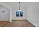 Bright dining room featuring recessed lighting, a chandelier, and a large window at 6169 Long Branch Rd, Salisbury, NC 28147