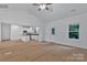 Spacious living area with vaulted ceilings, a modern kitchen, and an open layout at 6169 Long Branch Rd, Salisbury, NC 28147