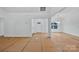 Bright living room featuring white walls, large windows, and an open floor plan at 6169 Long Branch Rd, Salisbury, NC 28147