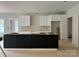 Spacious kitchen featuring sleek black lower cabinets paired with white upper cabinets, offering a modern design at 1500 Crowders Creek Rd, Gastonia, NC 28052