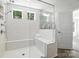 Bright bathroom featuring a spacious shower with subway tile and a built in bench at 2024 Cedar Falls Dr # 9, Waxhaw, NC 28173