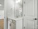 Bathroom with a white vanity, and an open doorway to a toilet and a view into the hallway at 2024 Cedar Falls Dr # 9, Waxhaw, NC 28173