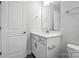 Bathroom featuring a modern vanity with a mirror and chrome fixtures at 2024 Cedar Falls Dr # 9, Waxhaw, NC 28173