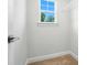Empty closet with carpeted floor, a window view and wire shelving at 2024 Cedar Falls Dr # 9, Waxhaw, NC 28173