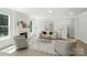 A cozy living room with fireplace, neutral tones, and comfortable seating arrangement at 2024 Cedar Falls Dr # 9, Waxhaw, NC 28173