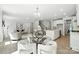 An open-concept living area with a seamless flow between dining and living at 2024 Cedar Falls Dr # 9, Waxhaw, NC 28173