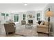An open-concept living space that includes a kitchen, dining, and living area at 2024 Cedar Falls Dr # 9, Waxhaw, NC 28173