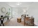 Cozy sitting area with natural light, stylish decor, and comfortable seating at 2024 Cedar Falls Dr # 9, Waxhaw, NC 28173