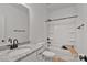 Modern bathroom features granite countertops and shower-tub combination at 6187 Long Branch Rd, Salisbury, NC 28147