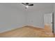Neutral bedroom with hardwood floors and doors leading to other rooms at 6187 Long Branch Rd, Salisbury, NC 28147