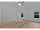 Spacious bedroom with large windows and ceiling fan, perfect for comfort at 6187 Long Branch Rd, Salisbury, NC 28147