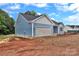 Newly built home featuring a two-car garage and classic design at 6187 Long Branch Rd, Salisbury, NC 28147