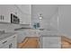 Stylish kitchen boasting granite countertops, stainless steel appliances, and white cabinets, ideal for culinary enthusiasts at 6187 Long Branch Rd, Salisbury, NC 28147