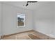 Cozy bedroom featuring a window and ample natural light, with a ceiling fan, ideal for a serene retreat at 6201 Long Branch Rd, Salisbury, NC 28147