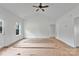 Spacious bedroom features a vaulted ceiling, fan, and natural light, offering a comfortable and inviting retreat at 6201 Long Branch Rd, Salisbury, NC 28147