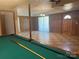 Game room featuring a pool table and wood paneled walls with large windows providing natural light at 2310 Montford Nw Ave, Concord, NC 28027