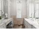 Elegant bathroom with marble vanities and double sinks at 4536 Fox Brook Ln, Charlotte, NC 28211