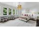 Comfortable bedroom with a neutral color palette and ample natural light at 4536 Fox Brook Ln, Charlotte, NC 28211