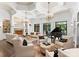 Elegant living room with high ceilings, fireplace, and hardwood floors at 4536 Fox Brook Ln, Charlotte, NC 28211