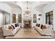 Bright living room with fireplace and built-in shelving at 4536 Fox Brook Ln, Charlotte, NC 28211