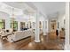 Spacious living room with high ceilings, fireplace and built-in shelving at 4536 Fox Brook Ln, Charlotte, NC 28211
