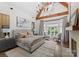 Spacious primary bedroom with high ceilings and a cozy sitting area at 4536 Fox Brook Ln, Charlotte, NC 28211