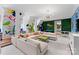 Playful and colorful rec room with a sectional sofa and game area at 4536 Fox Brook Ln, Charlotte, NC 28211