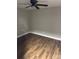 Bedroom featuring hardwood floors, a ceiling fan, and natural light at 702 N 9Th St, Bessemer City, NC 28016
