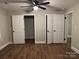 Bedroom with hardwood floors and multiple closets for ample storage at 702 N 9Th St, Bessemer City, NC 28016