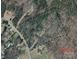 Aerial view of a wooded lot with approximate lot lines shown at 1451 York Rd, Kings Mountain, NC 28086