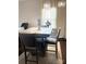 Stylish dining room with a modern table set, a decorative chandelier, and soft natural light at 916 Roxburgh Ave, Rock Hill, SC 29732