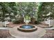 Charming courtyard with a central water fountain at 5003 Sharon Rd # L, Charlotte, NC 28210