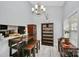 Bright dining area with built-in shelving and kitchen pass-through at 5003 Sharon Rd # L, Charlotte, NC 28210