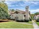 Attractive exterior of a two-story building with landscaping at 5003 Sharon Rd # L, Charlotte, NC 28210