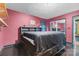 Bedroom featuring wood floor, black comforter, and a closet at 927 Kearney Dr, Shelby, NC 28152