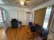 Inviting dining area with wood floors, table, and chairs by large window at 927 Kearney Dr, Shelby, NC 28152