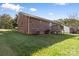 Back exterior of brick house with deck at 927 Kearney Dr, Shelby, NC 28152