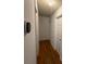 Bright hallway with hardwood floors and neutral paint at 927 Kearney Dr, Shelby, NC 28152