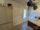 Cozy kitchen featuring white cabinets and a door with patterned glass at 927 Kearney Dr, Shelby, NC 28152