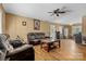 Spacious living room with cozy leather seating, hardwood flooring, and ample lighting at 927 Kearney Dr, Shelby, NC 28152