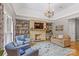 Cozy Gathering room with stone fireplace and built-in shelving at 183 April Rd, Troutman, NC 28166