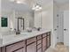 Double vanity bathroom with dark brown cabinets at 5267 Norway Ln, Rock Hill, SC 29732