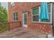 Wooden deck with access door and partial brick wall view at 5267 Norway Ln, Rock Hill, SC 29732
